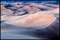 Large dune field in lilac afterglow. Great Sand Dunes National Park, Colorado, USA. (color)