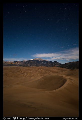 Dunes and Sangre de Cristo Mountains at night. Great Sand Dunes National Park and Preserve, Colorado, USA.