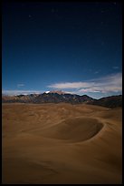 Dunes and Sangre de Cristo Mountains at night. Great Sand Dunes National Park and Preserve, Colorado, USA.