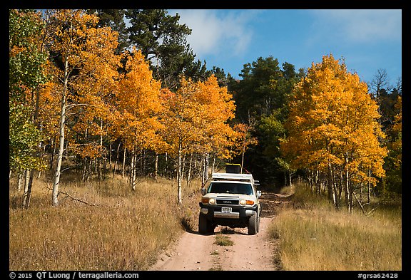4WD vehicle on Medano primitive road in autumn. Great Sand Dunes National Park and Preserve (color)