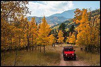 Jeep on Medano primitive road near Medano Pass in autumn. Great Sand Dunes National Park and Preserve, Colorado, USA.