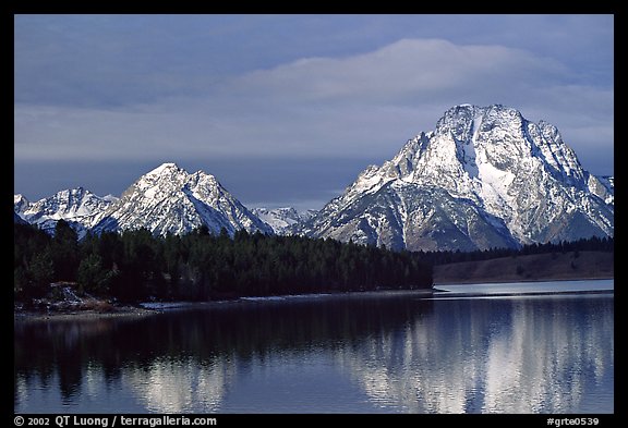 Mt Moran in early winter, reflected in Oxbow bend. Grand Teton National Park, Wyoming, USA.