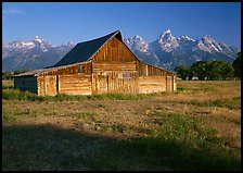 Historic Barn and Teton range, morning. Grand Teton National Park ( color)