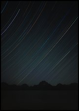 Star trails and Teton range. Grand Teton National Park ( color)