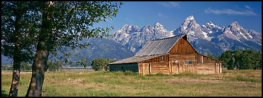 Rustic barn and Grand Teton range. Grand Teton National Park (Panoramic color)