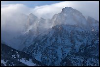 Cloud-capped Teton range, winter afternoon. Grand Teton National Park, Wyoming, USA.