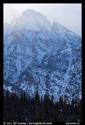 Towering mountain in winter. Grand Teton National Park, Wyoming, USA.