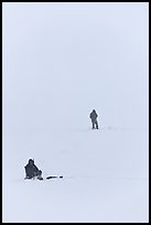 Ice fishermen on Frozen Jackson Lake. Grand Teton National Park, Wyoming, USA. (color)