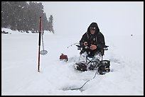Ice fisherman in white-out, Jackson Lake. Grand Teton National Park ( color)