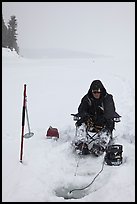 Ice fisherman with lounge chair and radar,Jackson Lake. Grand Teton National Park ( color)