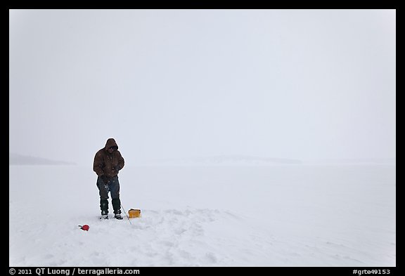Ice fishing on Jackson Lake. Grand Teton National Park, Wyoming, USA.