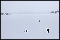 Jackson Lake in winter with ice fishermen. Grand Teton National Park, Wyoming, USA. (color)