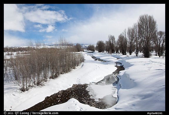 Snowscape with stream. Grand Teton National Park, Wyoming, USA.