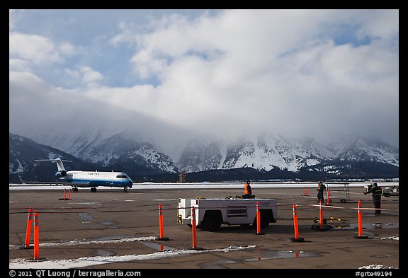 Jackson Hole Airport and cloud-capped Teton Range. Grand Teton National Park, Wyoming, USA.