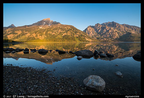 Teton Range reflected in Jenny Lake at sunrise. Grand Teton National Park (color)