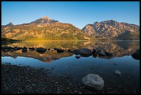 Teton Range reflected in Jenny Lake at sunrise. Grand Teton National Park ( color)