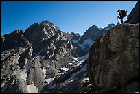 Mountaineer stands on rock looking at peaks, Garnet Canyon. Grand Teton National Park ( color)