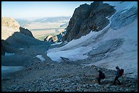 Mountaineers hiking down rocky trail, Garnet Canyon. Grand Teton National Park ( color)