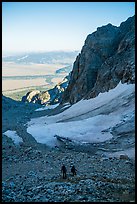 Mountaineers hiking down rocky slope, Garnet Canyon. Grand Teton National Park ( color)