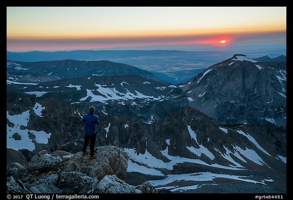 Mountaineer watches sunset from Lower Saddle. Grand Teton National Park (color)