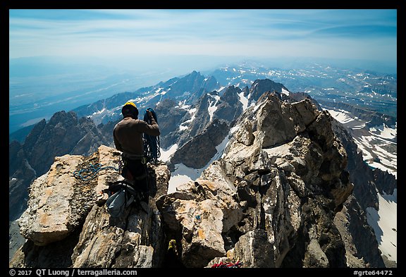 Climber coils rope on Upper Exum Ridge, Grand Teton. Grand Teton National Park (color)