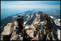 Climber coils rope on Upper Exum Ridge, Grand Teton. Grand Teton National Park ( color)