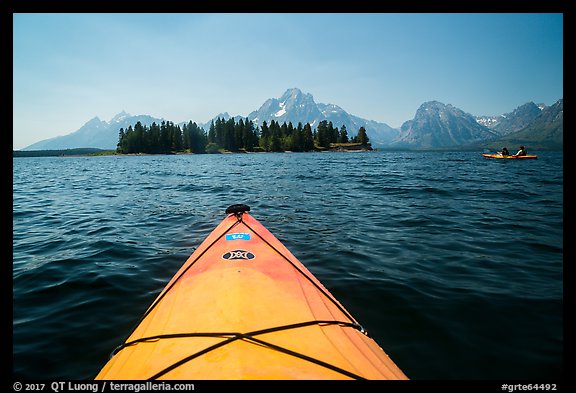 Kayak pointing at island in Colter Bay. Grand Teton National Park, Wyoming, USA.