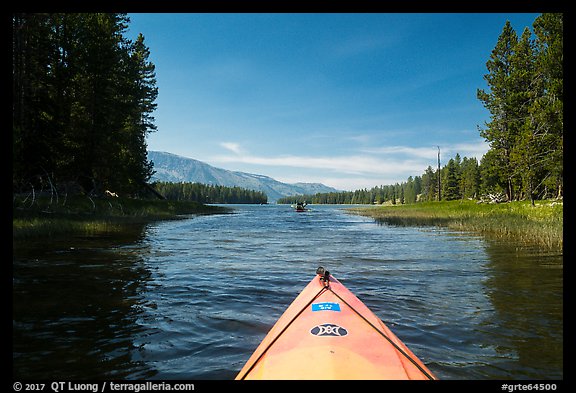 Kayak pointing at narrow channel, Colter Bay. Grand Teton National Park, Wyoming, USA.