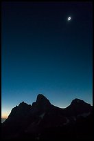 Solar eclipse above the Tetons, diamong ring. Grand Teton National Park, Wyoming, USA.