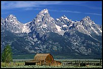 Moulton Barn and Grand Tetons, morning. Grand Teton National Park, Wyoming, USA.