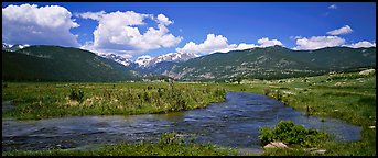 Mountain scenery with green meadows and stream. Rocky Mountain National Park, Colorado, USA.