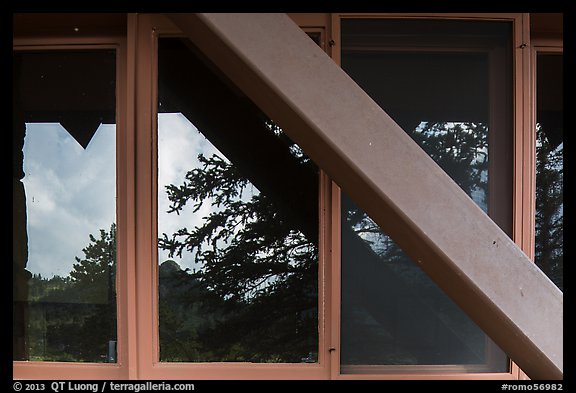 Foothills and trees, Beaver Meadows Visitor Center window reflexion. Rocky Mountain National Park, Colorado, USA.