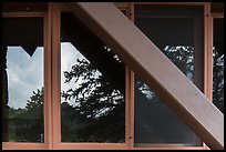 Foothills and trees, Beaver Meadows Visitor Center window reflexion. Rocky Mountain National Park, Colorado, USA. (color)