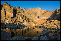 Chasm Lake with Longs Peak, Mt Meeker, and Mount Lady Washington at sunrise. Rocky Mountain National Park, Colorado, USA.