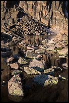 Rock wall, and boulders, Chasm Lake. Rocky Mountain National Park, Colorado, USA.