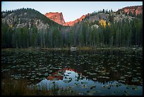 Hallet Peak above Nymph Lake at sunrise. Rocky Mountain National Park, Colorado, USA.