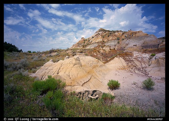 Colorful badlands and clouds, North Unit. Theodore Roosevelt National Park (color)