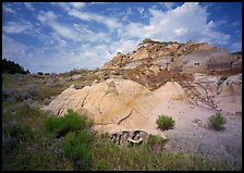 Colorful badlands and clouds, North Unit. Theodore Roosevelt National Park, North Dakota, USA.