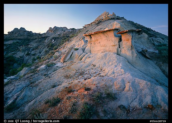 Badlands and caprock formation at sunset, South Unit. Theodore Roosevelt National Park (color)