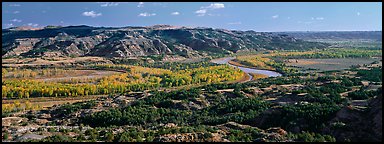 Wide valley with river and aspens in autumn color. Theodore Roosevelt  National Park (Panoramic color)