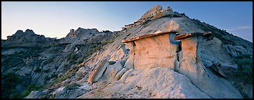 Badlands scenery with caprocks. Theodore Roosevelt National Park, North Dakota, USA.