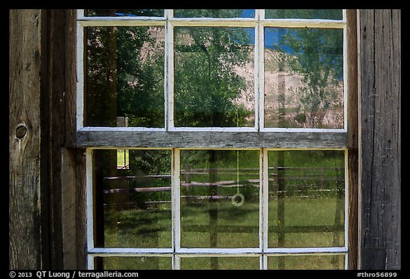 Badlands reflected in Maltese Cross cabin window. Theodore Roosevelt National Park (color)