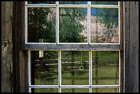 Badlands reflected in Maltese Cross cabin window. Theodore Roosevelt National Park ( color)