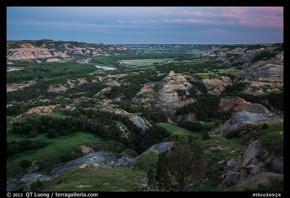 Badlands and Little Missouri oxbow bend at dusk. Theodore Roosevelt National Park, North Dakota, USA.