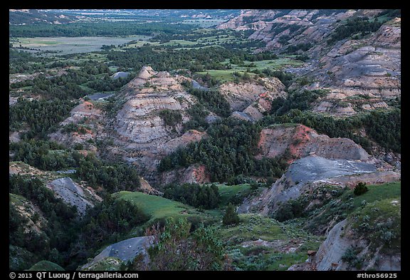 Badlands in summer at dusk. Theodore Roosevelt National Park, North Dakota, USA.