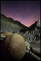 Cannonball and badlands at night. Theodore Roosevelt National Park, North Dakota, USA. (color)