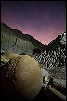 Cannonball and badlands at night. Theodore Roosevelt National Park, North Dakota, USA.