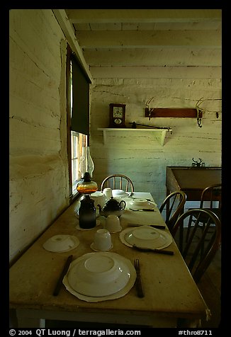 Dining table inside Roosevelt's Maltese Cross Cabin. Theodore Roosevelt National Park, North Dakota, USA.