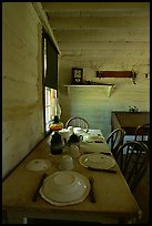 Dining table inside Roosevelt's Maltese Cross Cabin. Theodore Roosevelt National Park, North Dakota, USA.