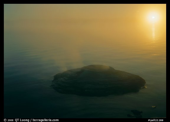 Fishing cone, fog, and  sun rising. Yellowstone National Park (color)